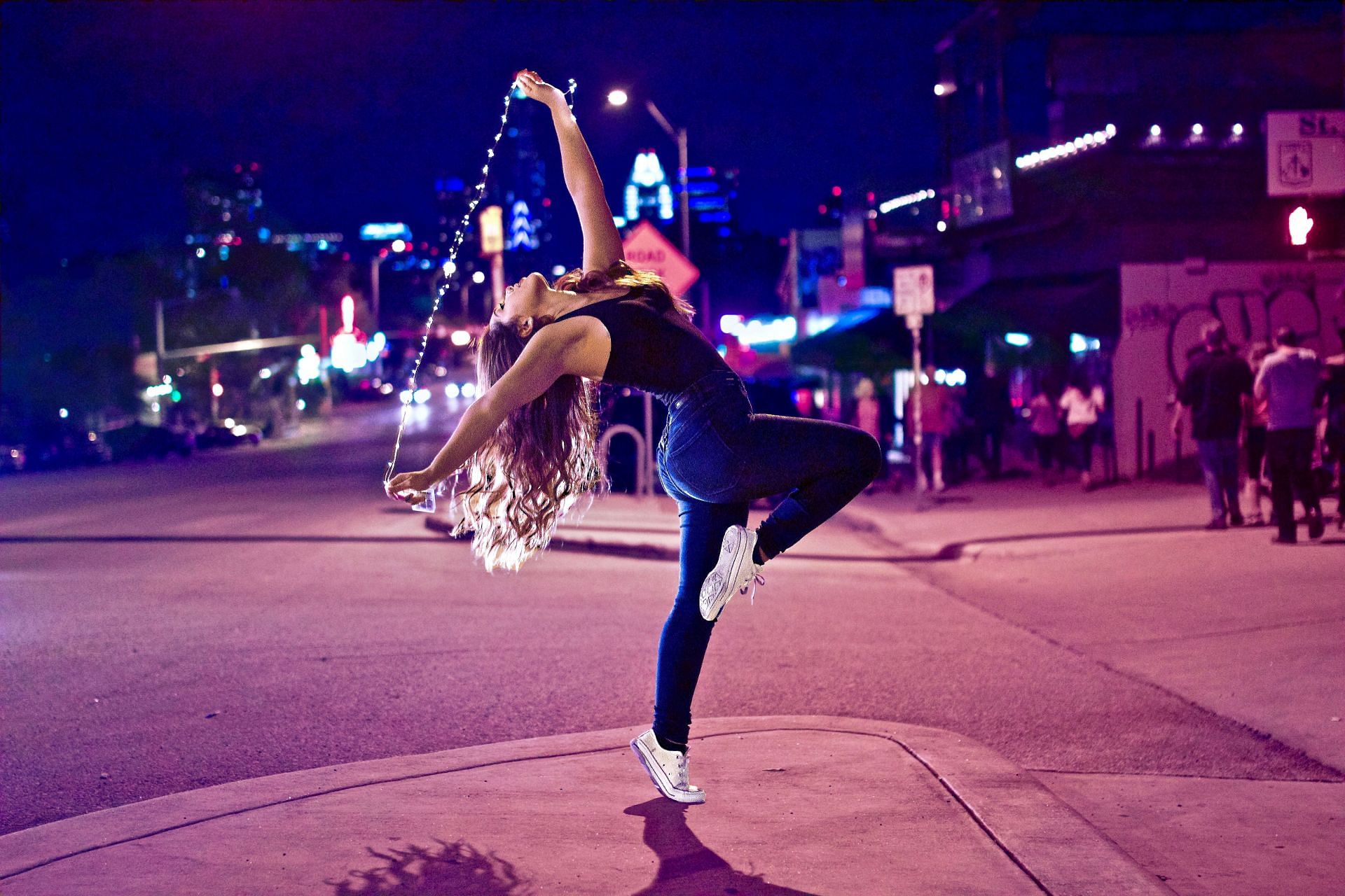 Latin dance workout (Image via Unsplash/Aditya Ali)